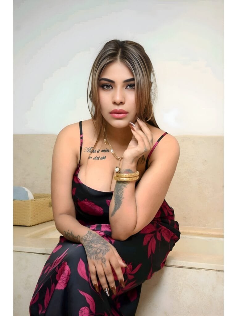 Jiya Wild looking into the camera – confident and inked escort in Kolkata
